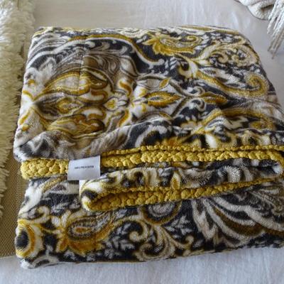 Set of Four Throw Blankets, One Quilt and Two Ivory Shag Rugs