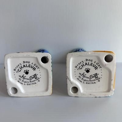 PAIR, KAREN GELFF HAPPY DOG & CAT CHALEUR CANDLESTICKS