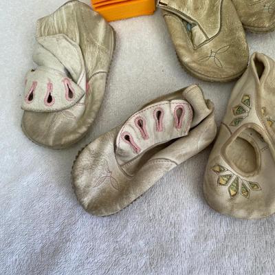 Lot of antique baby shoes