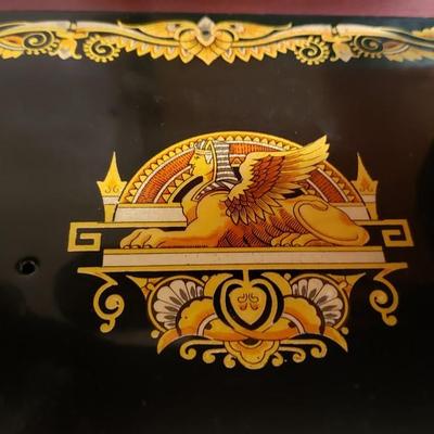 Singer Golden Sphinx sewing machine in cabinet