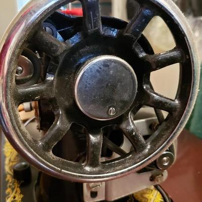 Singer Golden Sphinx sewing machine in cabinet