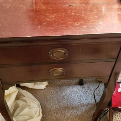 Singer Golden Sphinx sewing machine in cabinet