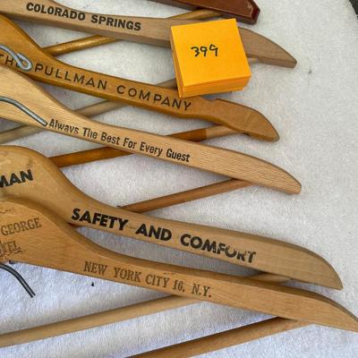 Lot of Wood Clothes Hangers Advertising
