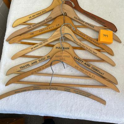 Lot of Wood Clothes Hangers Advertising