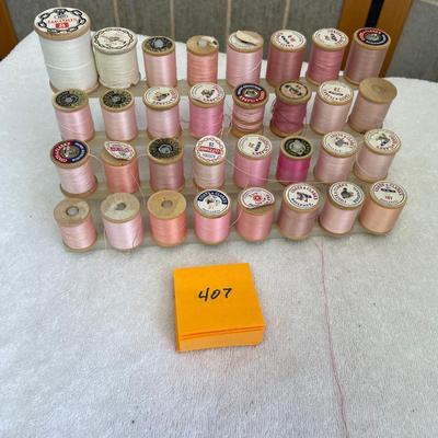 Vintage spool rack with wood spools