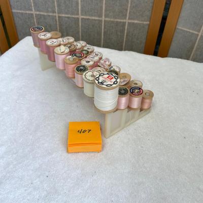 Vintage spool rack with wood spools