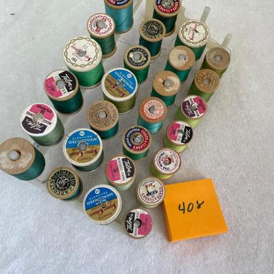 Spool rack with wood spools