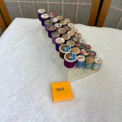 Spool rack with wood spools