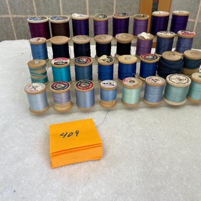 Spool rack with wood spools