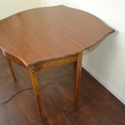 LOT 214. VINTAGE FOLDING GATE LEG TABLE