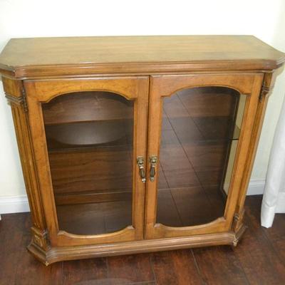 LOT 221 VINTAGE CABINET WITH GLASS DOORS AND GLASS SHELVES