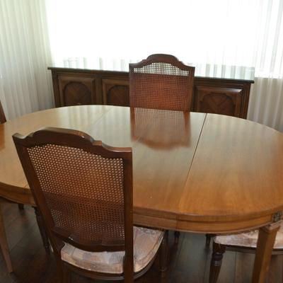 LOT 322.  VINTAGE DINING TABLE WITH CANE BACK CHAIRS