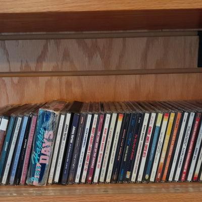 LARGE COLLECTION OF CD/ COMPACT DISC MUSIC, COUNTRY, ROCK AND ROLL AND MORE