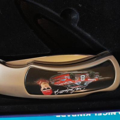 HARDBACK BOOK THE DRIVERS OF NASCAR. AND A NEW DALE EARNHARDT JR. KNIFE IN A TIN