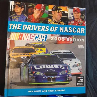 HARDBACK BOOK THE DRIVERS OF NASCAR. AND A NEW DALE EARNHARDT JR. KNIFE IN A TIN