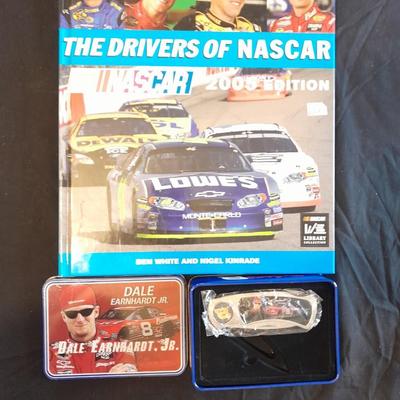 HARDBACK BOOK THE DRIVERS OF NASCAR. AND A NEW DALE EARNHARDT JR. KNIFE IN A TIN
