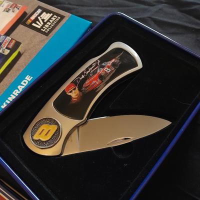HARDBACK BOOK THE DRIVERS OF NASCAR. AND A NEW DALE EARNHARDT JR. KNIFE IN A TIN