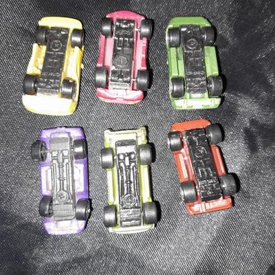 TWELVE MICRO MACHINE CARS  CAR CASE KEYCHAIN AND MICRO CHARGER !