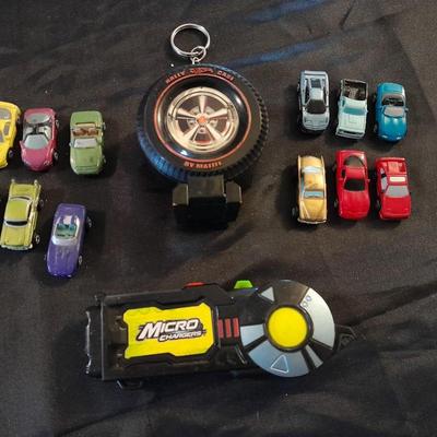 TWELVE MICRO MACHINE CARS  CAR CASE KEYCHAIN AND MICRO CHARGER !