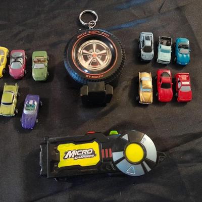 TWELVE MICRO MACHINE CARS  CAR CASE KEYCHAIN AND MICRO CHARGER !