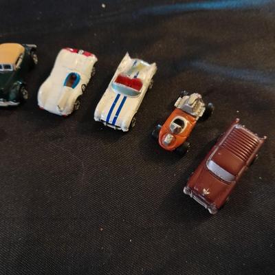 TEN MICRO MACHINE CARS AND A NEW IN PACKAGE RACING CHAMPIONS HOT ROD MICRO