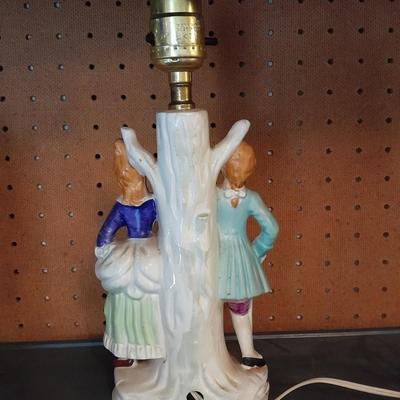 TWO MATCHING COLONIAL STYLE PORCELAIN LAMPS HAND PAINTED MAN & WOMAN