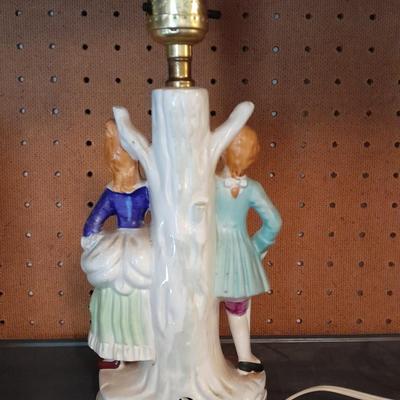 TWO MATCHING COLONIAL STYLE PORCELAIN LAMPS HAND PAINTED MAN & WOMAN