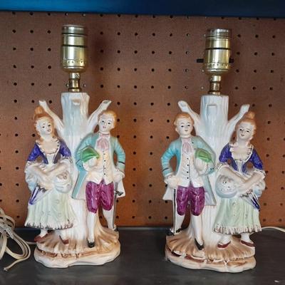 TWO MATCHING COLONIAL STYLE PORCELAIN LAMPS HAND PAINTED MAN & WOMAN