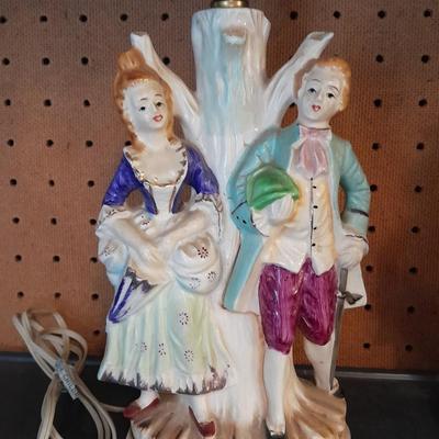 TWO MATCHING COLONIAL STYLE PORCELAIN LAMPS HAND PAINTED MAN & WOMAN