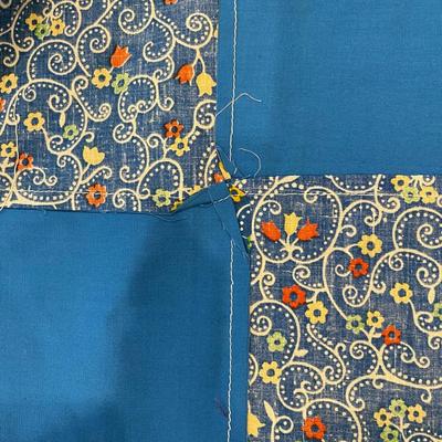 Quilt fabric pieces.