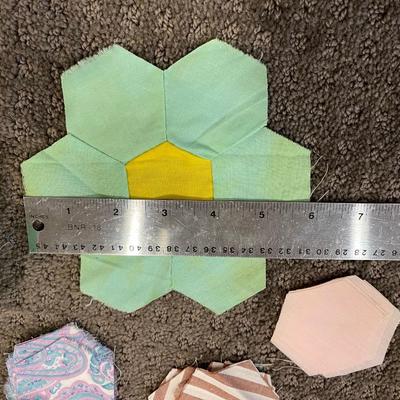 Quilt fabric pieces.