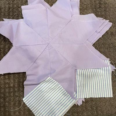 Quilt fabric pieces.