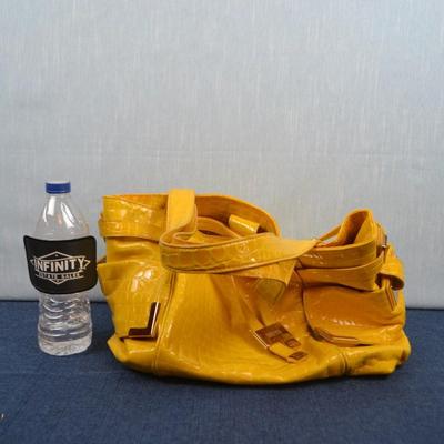 LOT 387. MICHAEL KORS YELLOW PURSE