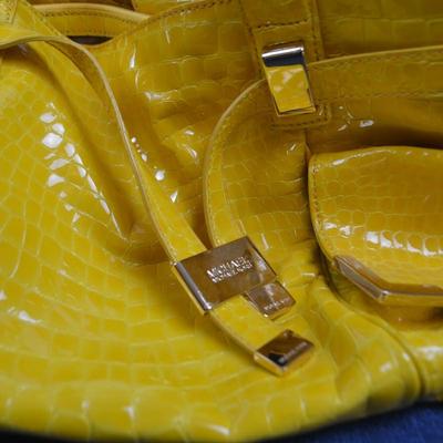 LOT 387. MICHAEL KORS YELLOW PURSE