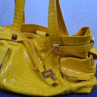 LOT 387. MICHAEL KORS YELLOW PURSE