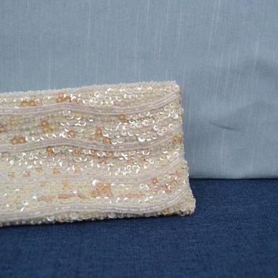 LOT 391.  FOUR LADIES HANDBAGS