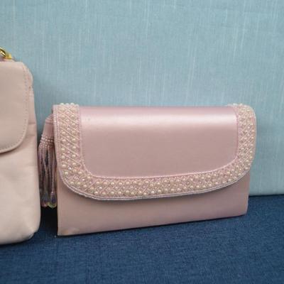 LOT 392. TWO LADIES HANDBAGS