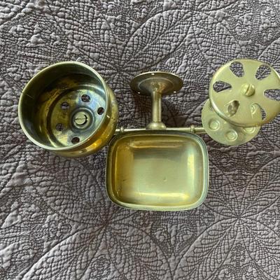 Solid brass bathroom item. Soap, cup, and toothbrushes
