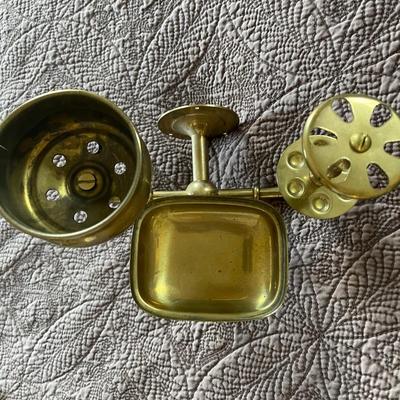 Solid brass bathroom item. Soap, cup, and toothbrushes
