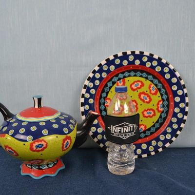 LOT 406. HOME DECOR TEA POT AND PLATE