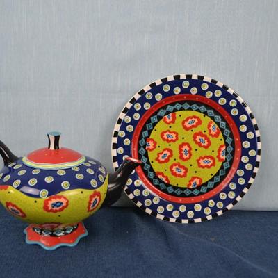LOT 406. HOME DECOR TEA POT AND PLATE