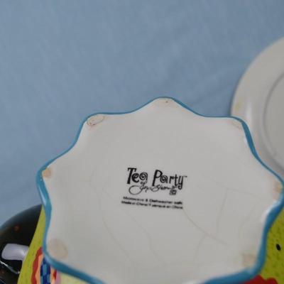 LOT 406. HOME DECOR TEA POT AND PLATE