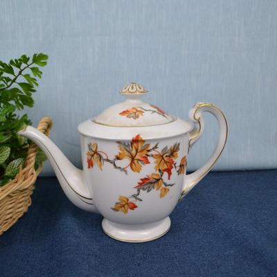 LOT 408. DECORATIVE PLANTS AND TEA POT
