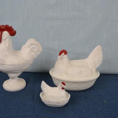 LOT 410. THREE MILK GLASS CHICKENS