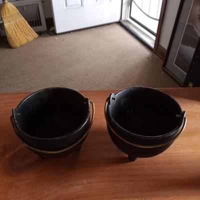 TWO CAST IRON POTS
