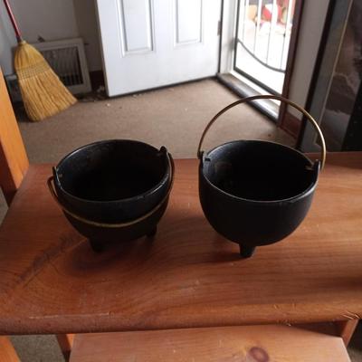 TWO CAST IRON POTS