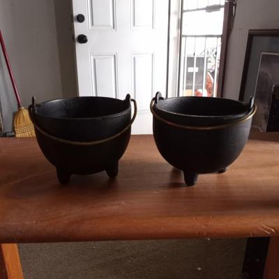 TWO CAST IRON POTS