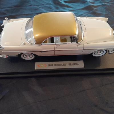 1955 CHRYSLER IMERIAL MODEL CAR ON STAND