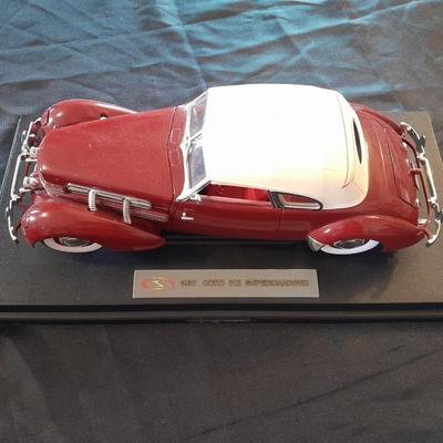 1937 CORD 812 SUPERCHARGED CAR MODEL MOUNTED ON A STAND