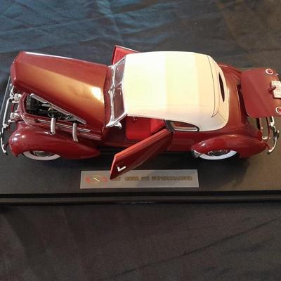1937 CORD 812 SUPERCHARGED CAR MODEL MOUNTED ON A STAND